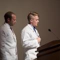 two people in white coats